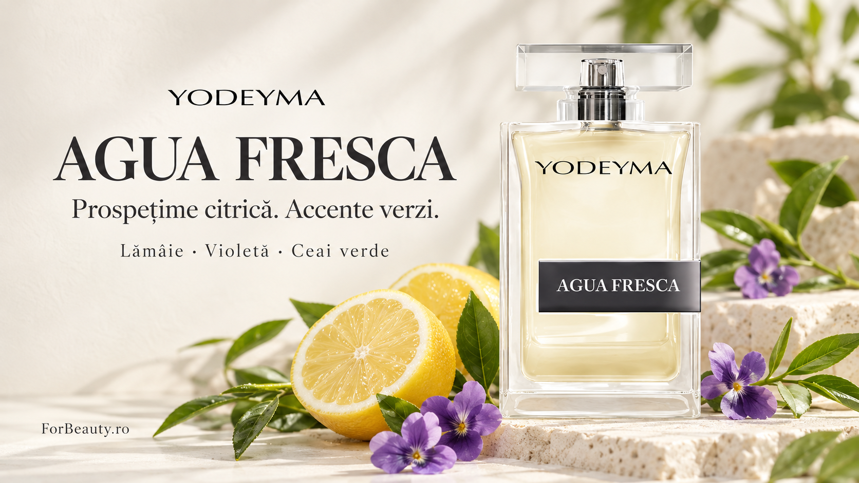 Flacon Yodeyma Agua Fresca lângă lămâie, violete și frunze verzi